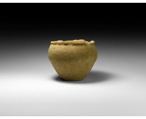 2nd century BC-1st century AD. A biconvex ceramic jar with narrow base, flared rim.   408 grams, 13cm (5"). Property of an En