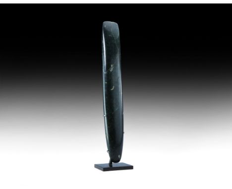 Neolithic, 5th-3rd millennium BC. A very long and superbly polished veined greenstone axe, probably of European origin, with 