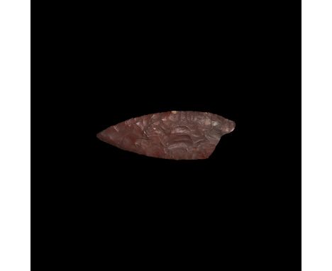 Neolithic, 7th-4th millennium BP. A beautifully knapped and very lightly polished bifacial dagger blade of pointed oval form 