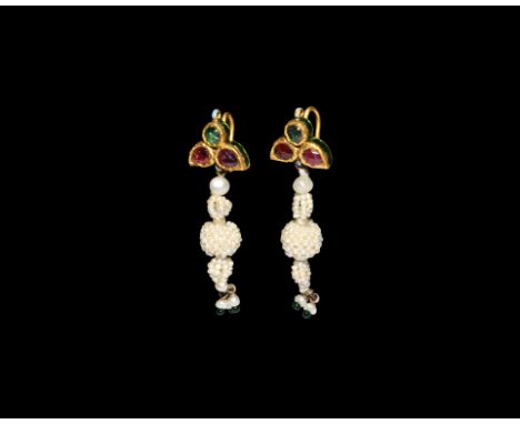 20th century AD. A matching pair of gold earrings with hook closure, comprising a central green glass cabochon with two leaf-