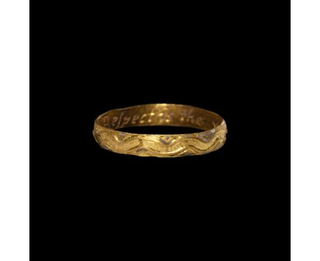 18th century AD. A slender gold finger ring with hatched meander to the outer face, inscribed to the inner face in italic scr