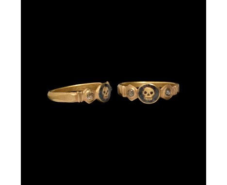 18th century AD. A gold ring with keeled hoop and expanding shoulders, the bezel formed of three discoid plaques, two with in