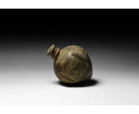 9th-11th century AD. A hollow ceramic vessel with conical body, intended to be filled with explosive liquid and a wick, and u