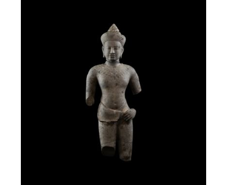 13th century AD. A sandstone standing figure of Shiva wearing ornately detailed collar and band to upper right arm, a simple 