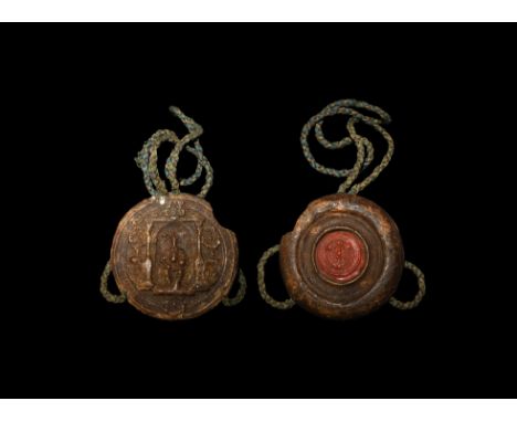 1576-1612 AD. A large wax document seal, discoid in plan with one flat ornamented face and gusset to the underside surroundin