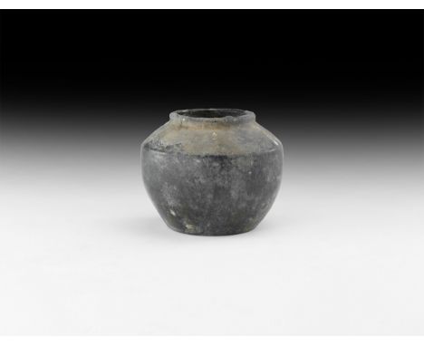 Ming Dynasty, 1368-1644 AD. A green-glazed ceramic vessel.   768 grams, 15cm (6"). From the Cheuk family collection, formed H