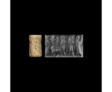 1st millennium BC. A fossil shell cylinder seal with frieze of robed figures.   15 grams, 27mm (1"). Property of a Bristol co