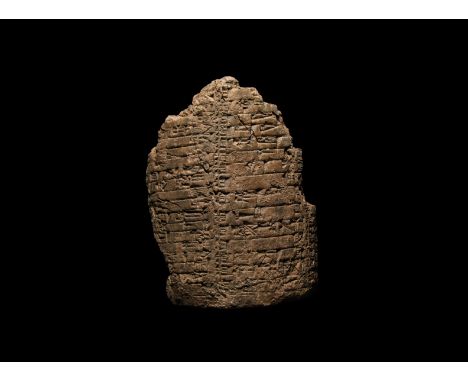 1900-1700 BC. A large section of a ceramic cylinder with impressed cuneiform text; accompanied by a handwritten signed note b