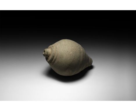 9th-11th century AD. A ceramic bulbous vessel with domed top and flat base, intended to be filled with explosive liquid and w