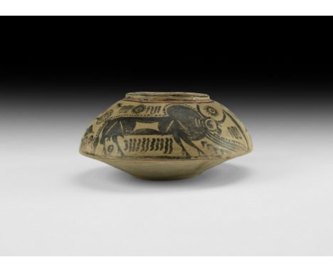 3rd-2nd millennium BC. A biconvex ceramic vessel with broad domed shoulder and raised rim; painted frieze to the shoulder wit