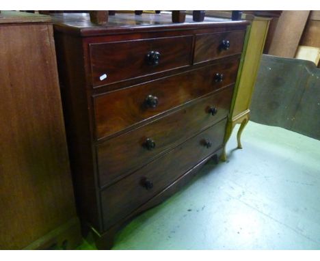 A 19th century mahogany bedroom chest of three long and two short drawers with shaped apron and bracket supports, 116 cm wide