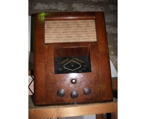A vintage timber cased Pye medium wave, long and short wave wireless radio, 15 x 40 cm approx