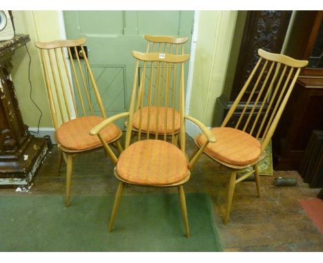 A set of four (3&1) Ercol light elm and beechwood high stick back dining chairs with cow horn rails