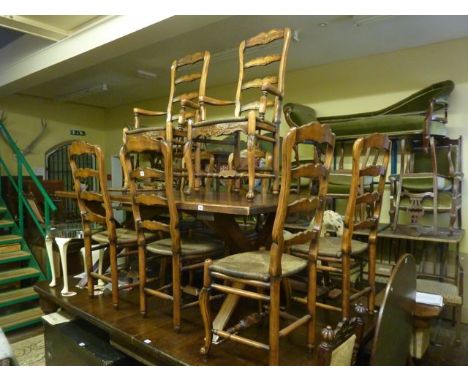 A set of eight (6&2) Flemish ladder back dining chairs principally in fruitwood with carved detail and rush seat