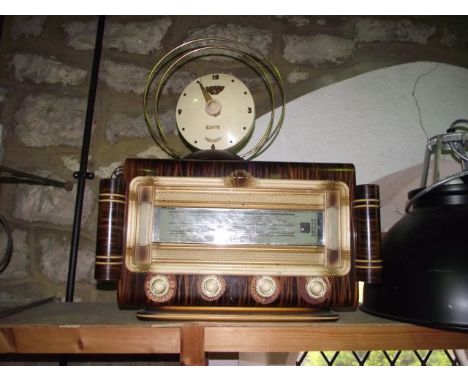 A vintage French timber cased wireless radio set with simulated timber finish and Bakelite type mounts, etc, 54 cm tall x 29 