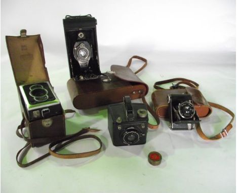 Vintage photographic equipment to include a cased Kodak No 3A Pocket Kodak together with a cased Zeiss-Ikon Compur camera, a 
