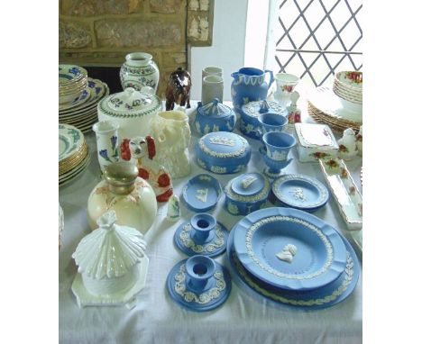 A collection of Wedgwood Jasperwares in the pale blue colourway including two circular trinket boxes and covers, an oval trin