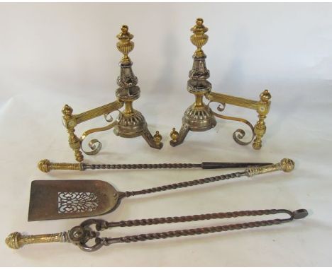 A pair of good quality mid-Victorian, (circa 1870), antique  fire dogs, principally in worked steel and brass, with finial de