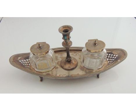 A Victorian silver inkstand, Atkin Brothers, Sheffield, 1896, the boat-shaped body with pierced decoration and reeded rim, th