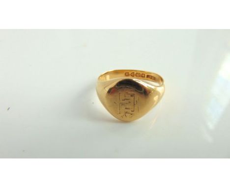 An 18ct gold signet ring, with monogram, size R 1/2, 3.9g