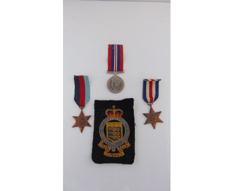 Group of three WWII medals to W Jones, Blandford, Dorset, War Medal, 39-45 Star, France & Germany Star with cloth badge for R