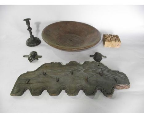 A substantial shallow hewn antique timber bowl together with a single deep fired brick with incised detail, a single antique 