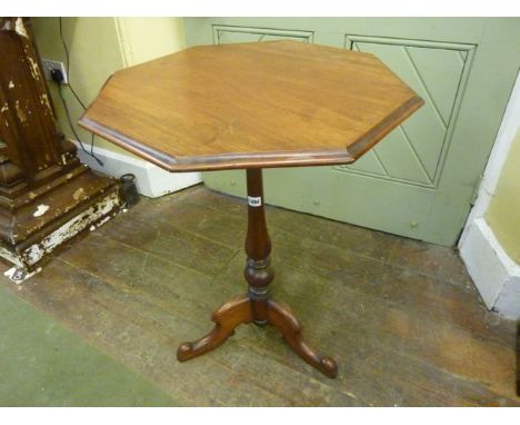 A Victorian mahogany occasional table, the octagonal top raised on a vase shaped pillar and tripod