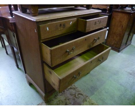 A Georgian stripped mahogany bedroom chest of three long and two short drawers raised on bracket supports, 3ft wide approxima