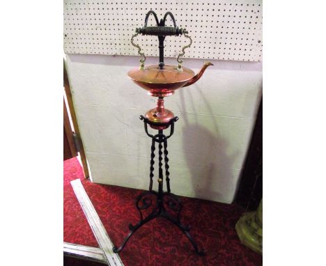 A good quality 19th century copper kettle with brass and turned timber looping handle together with an associated lidded burn