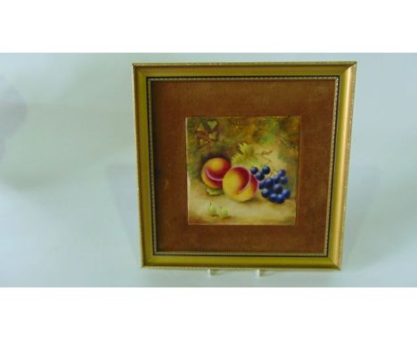 A ceramic plaque in the Royal Worcester manner with painted decoration of peaches and grapes in a woodland setting, signed bo