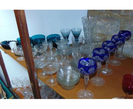 An extensive collection of glassware to include six turquoise finger bowls, a liqueur decanter with vertical cut detail and f