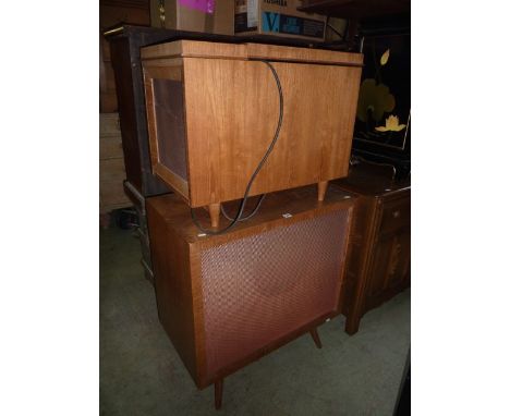 A vintage teak framed floorstanding radiogram with Connoisseur record deck raised on short turned tapered legs with integral 