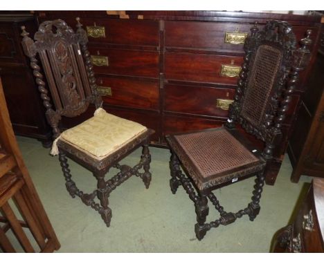 A pair of Victorian oak dining/side chairs with carved frames raised on turned and block supports united by stretchers togeth