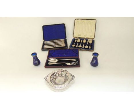 A pair of Edwardian silver-mounted glass posy vases, J. H. Worrall, Son & Co. Ltd, London, 1908, each blue tapering body with