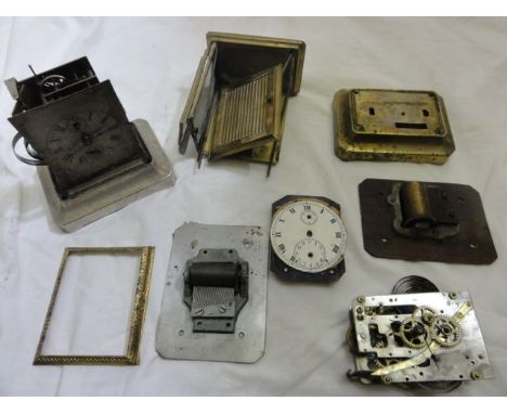 A small collection of sundry clock parts, mainly German mantle clock pieces including mechanisms, case work, etc