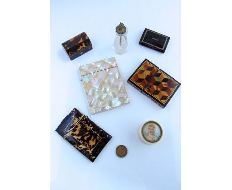 A 19th century toroiseshell card case, another Tunbridge ware example and another in mother-of-pearl, two further tortoiseshe