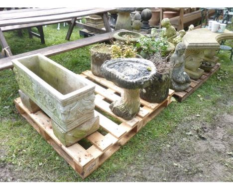 Three weathered cast composition stone garden planters in the form of tree stumps, a further planter of rectangular form with