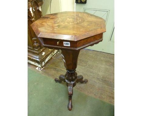 A Victorian figured walnut trumpet shaped work box with marquetry inlay on a turned pillar and tripod base