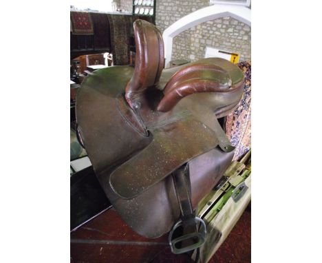 A good quality antique tan leather side saddle bearing stamp Champion & Wilton by appointment to His Majesty the King, 457 & 