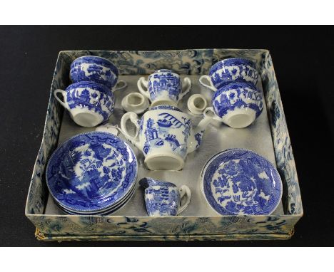 Blue and white doll's tea service, with place settings for four, housed in original willow pattern box