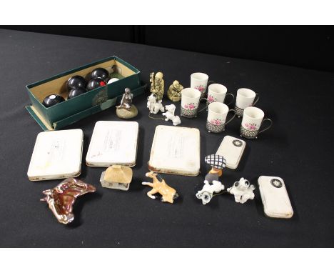 Works of art, to include boxed carpet bowls, set of six four pottery coffee cans with silver plated holders, pair of Okimono 