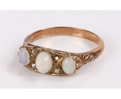 Opal and diamond set ring, with three opals and four diamonds (one missing) to the head, ring size O