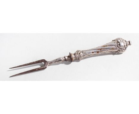 Early 19th Century two pronged fork in white metal with steel prongs 12cm