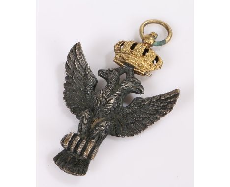 Gilt and white metal pendant with crown finial above a double headed eagle, 8cm 