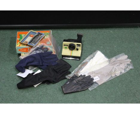 Ladies gloves, Polaroid camera, Hohner and Victory harmonicas, Lotto and Tell Me board games (qty)