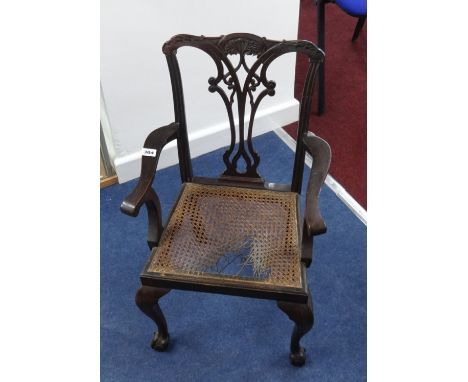 A child's Chippendale style mahogany corner chair.