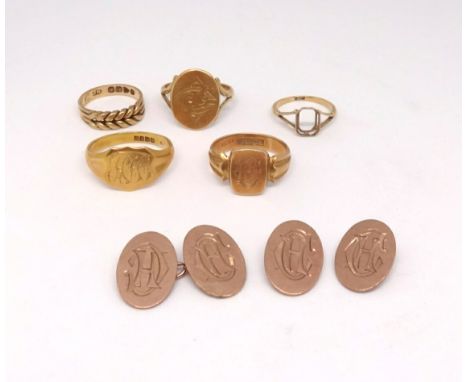 A pair 9ct cufflinks (8.70g), an 18ct matching ring &amp; 4 other 18ct rings (24g).