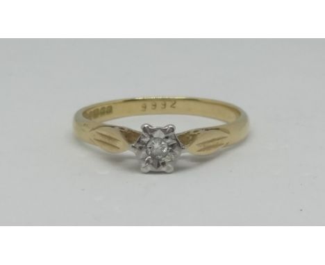 An 18ct illusion set diamond solitaire ring, approx 2.80g.