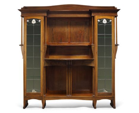 Liberty & Co (British), a Mahogany Display cabinet c.1905, stamped on lock plates Liberty & Co Ltd London The moulded cornice