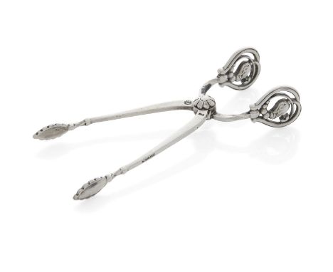 Georg Jensen (Danish 1866-1935), a pair of silver 'Blossom' pattern sugar nips Mark of Georg Jensen, 'GI' in an oval used 191